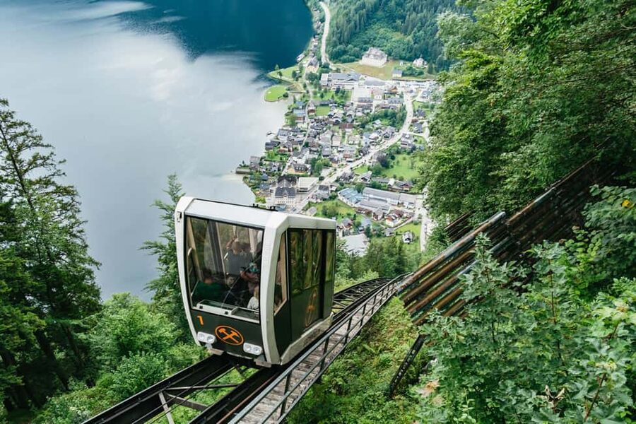 Vienna: Hallstatt & Alpine Peaks Day Trip with Skywalk Lift - Schloss Ort and the wedding bridge: the quick photo stop that sets the tone