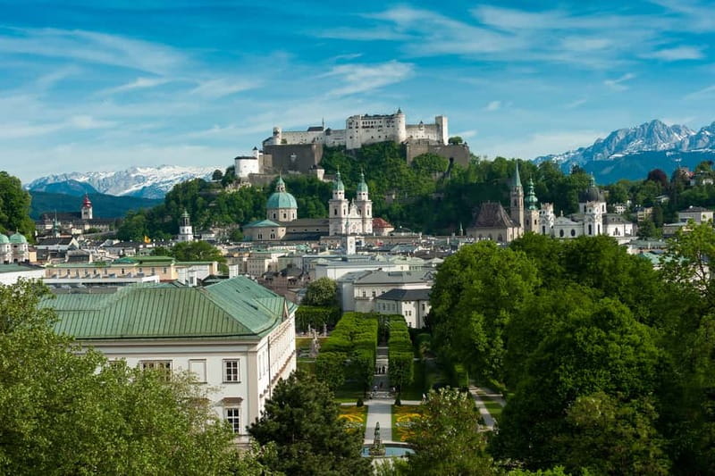 Vienna: Hallstatt, Salzburg, Melk, Alps & Lakes Day Trip - Hallstatt town and lake views, how to make 90 minutes count