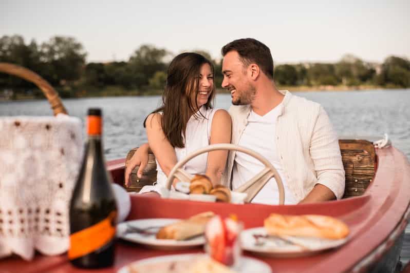 Vienna: Retro Boat Tour on the Danube River with Picnic - Weather reality: Old Danube stays brighter, but plan for rain