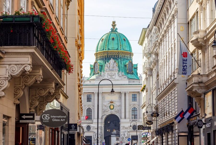 Vienna: Skip-the-Line Sisi Museum, Hofburg and Gardens Tour - Entering the Hofburg Palace complex: courtyards, Heldenplatz, and Burggarten